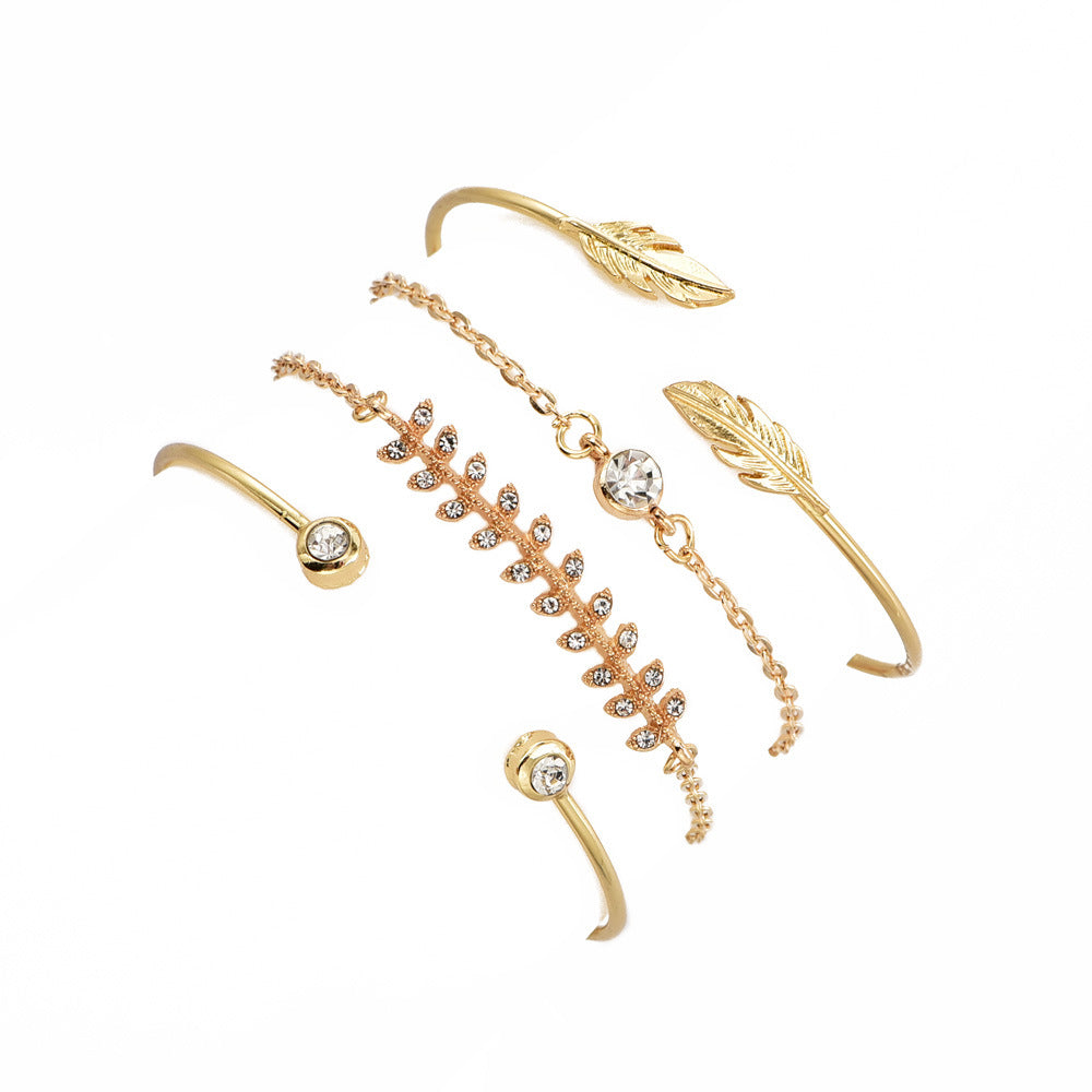 Set of 4 Boho Bracelets with Stars, Moons, and Leaves