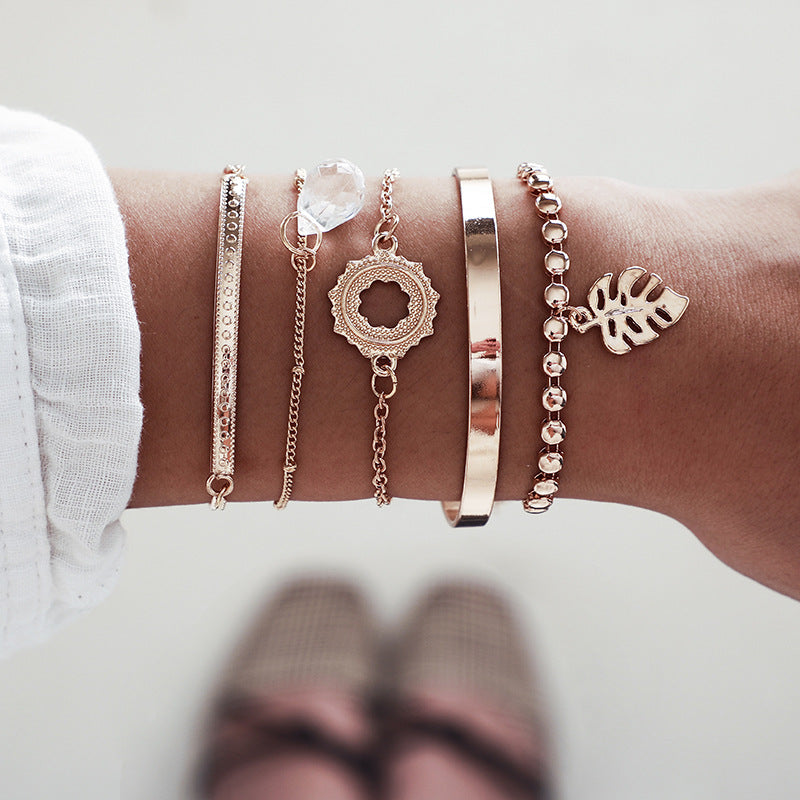 Set of 4 Boho Bracelets with Stars, Moons, and Leaves