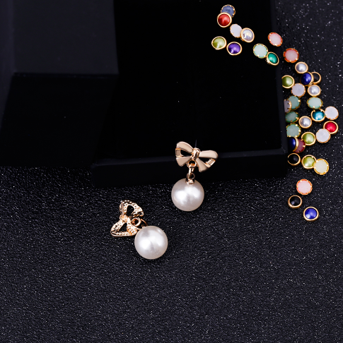 Pearl Drop Earrings with Bowknot Design